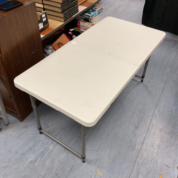 Portable folding camping table for outdoor use.