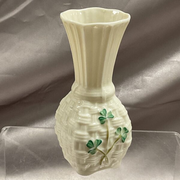 Vintage Beleek Ireland shamrock vase on display.