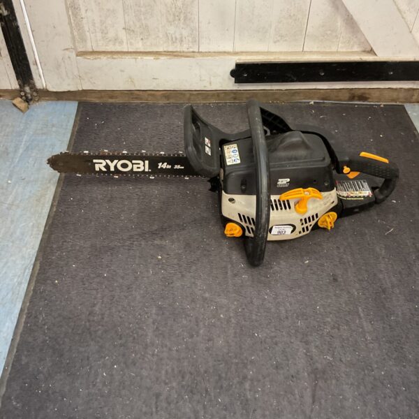 Side view of a Ryobi petrol chainsaw for garden and DIY use.