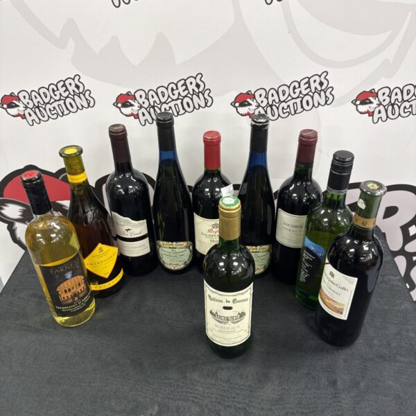 Assorted wine bottles presented as a collectible lot.