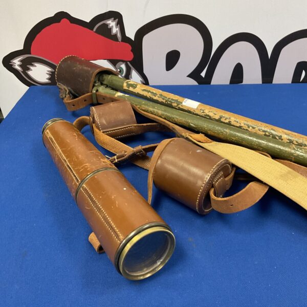 Vintage WW2 New Zealand telescope with leather wrap and tripod.