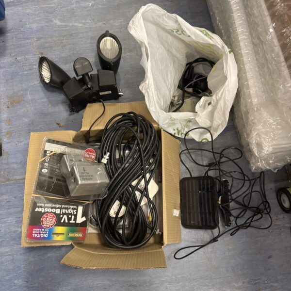 Mixed lot of TV aerial kit and security lamp components.