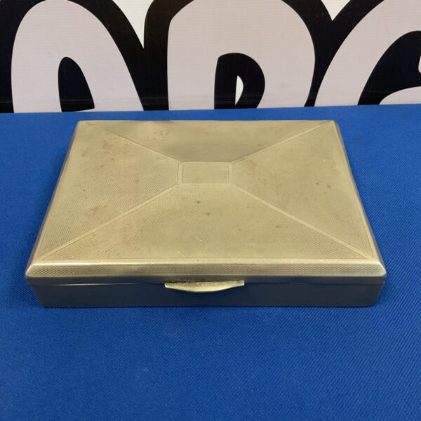 Vintage silver plated State Express cigarette case with art deco design.