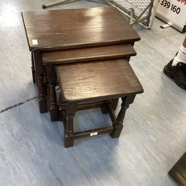 Dark wood nest of tables, vintage style furniture.