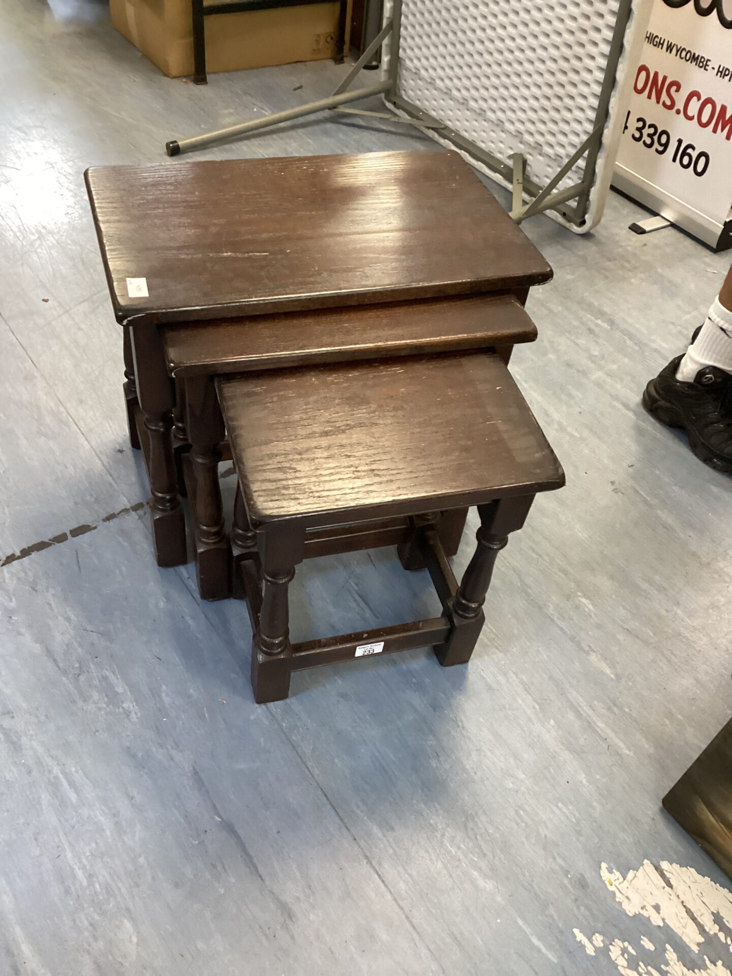 233 Nest of dark wood tables