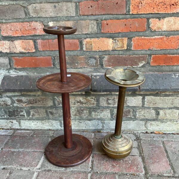 Pair of vintage floor standing ashtrays in dark wood finish.