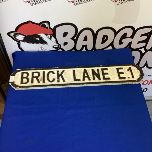 Vintage wooden Brick Lane sign, London street sign.