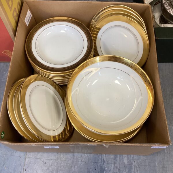 Vintage Heinrich Winterling porcelain dinner plates with floral design.