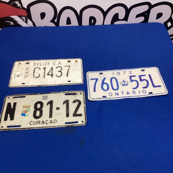 Vintage licence plates lot for collectors and automotive enthusiasts.