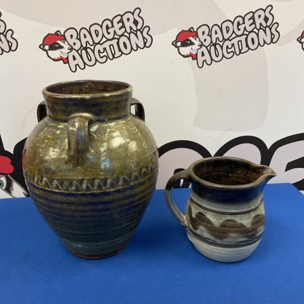 Vintage Nigerian pottery jug and vase set, showcasing African earthenware.