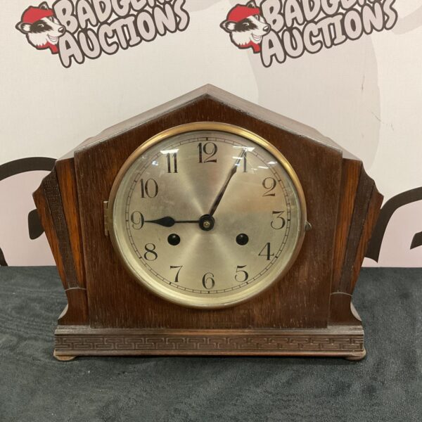 Vintage 1930s Art Deco mantle clock with pendulum and key.