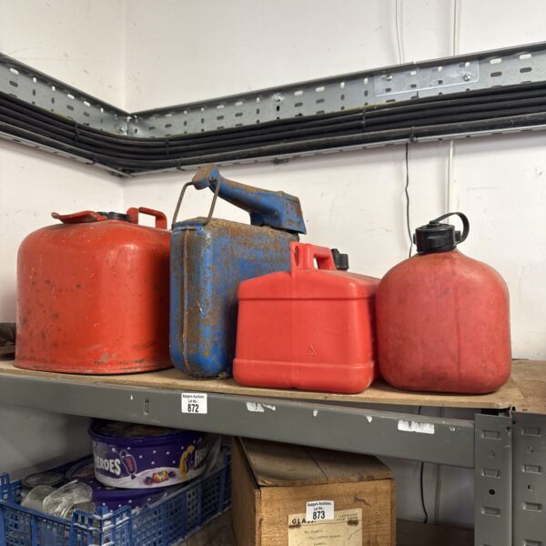 Lot of four vintage petrol cans, including Johnson Marine and Eversure.