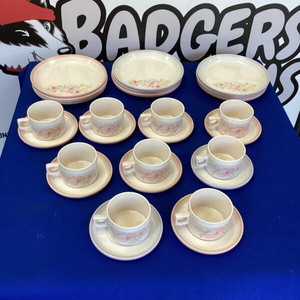 Vintage Hornsea Pottery cups and saucers with a floral design.