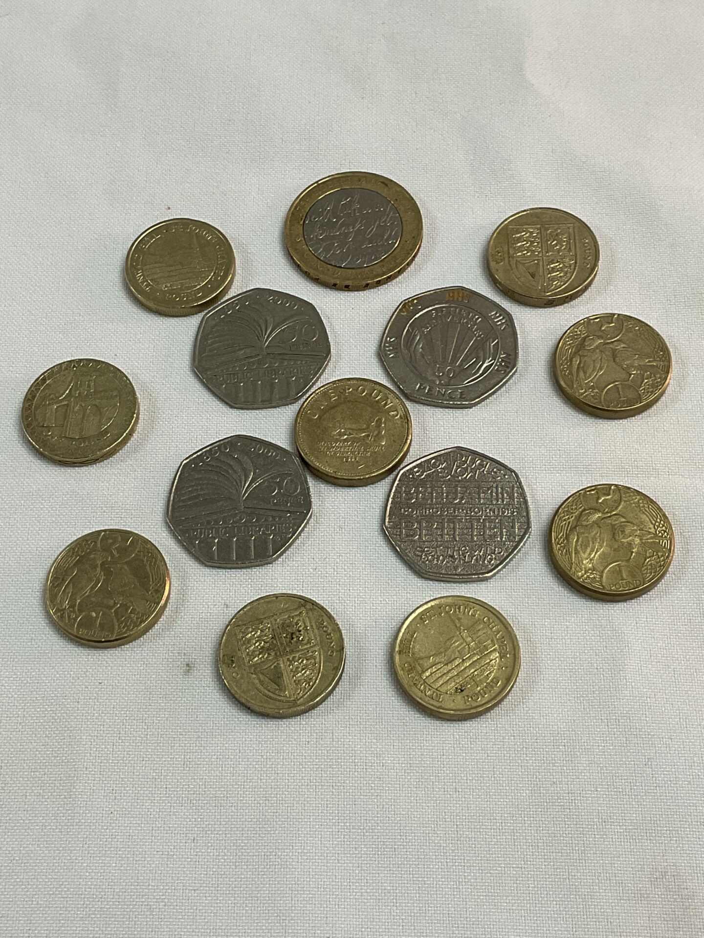 730 two pound coin nine one pound coins and four fifty pence commemorative coins