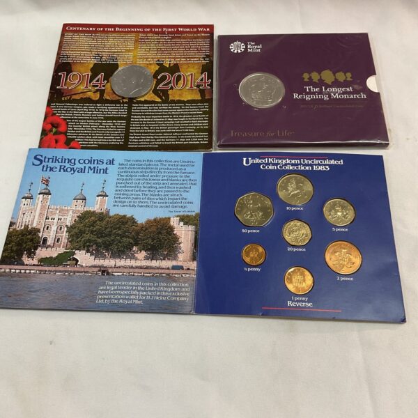Framed Windsor Monarch Penny Collection with commemorative coins.