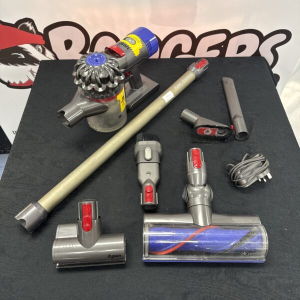 Dyson V8 Animal cordless vacuum cleaner with attachments.