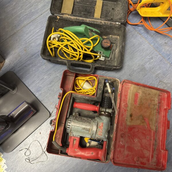 Hilti TE17 SDS drill and Hitachi sander in a tool case.