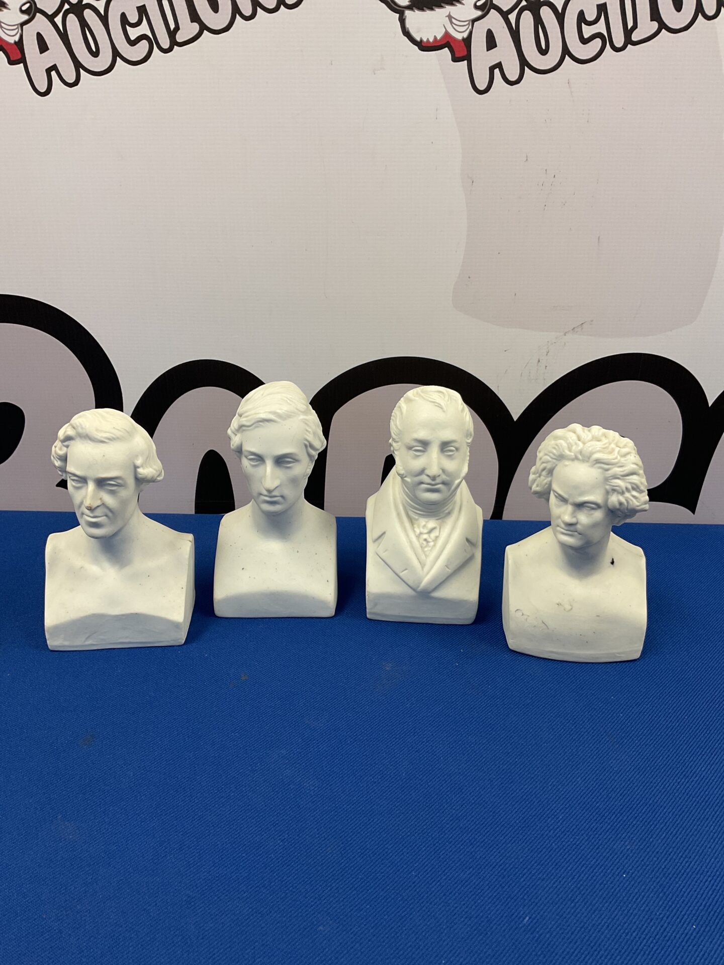 048 Set of four bisque porcelain busts of composers