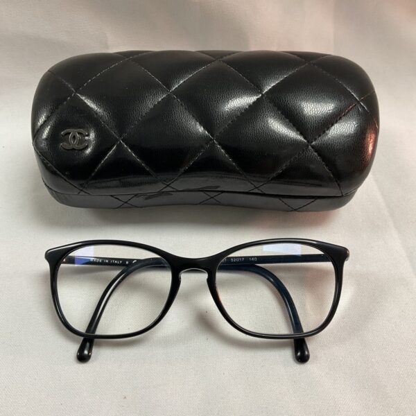 Black Chanel reading glasses in quilted case, designer eyewear.