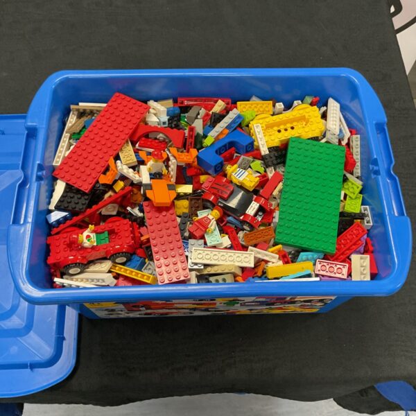 Colourful mixed Lego lot with vintage bricks and minifigures.