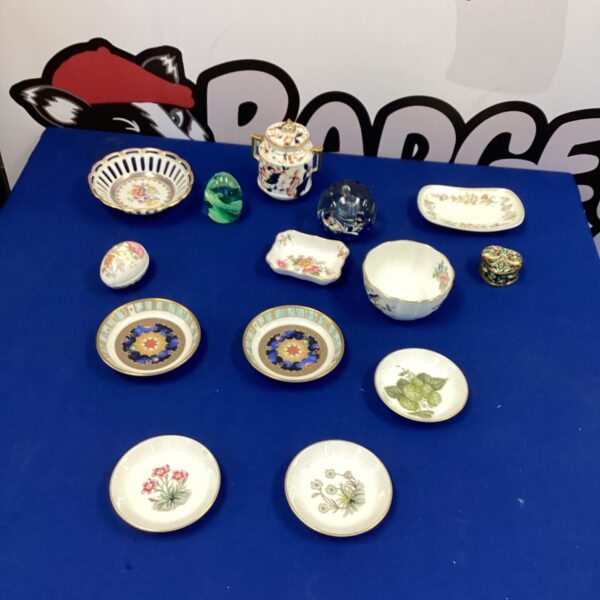 Mixed china and glass lot with decorative items and paperweights.