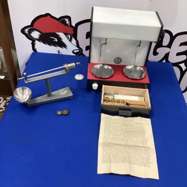 Vintage balance scales with weights, including Auto-Magnetic Vll mechanism.