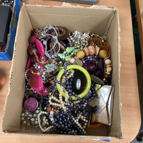 Colourful costume jewellery lot with beaded necklaces and fashion pieces.