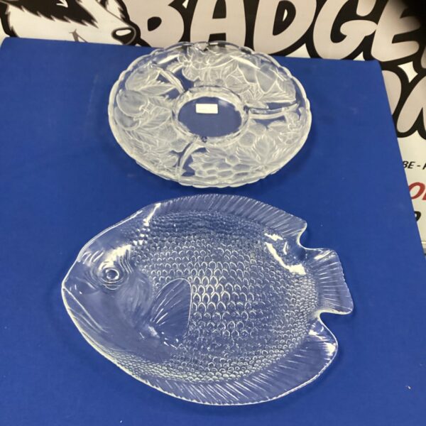 Vintage glass platter shaped like a fish for serving.