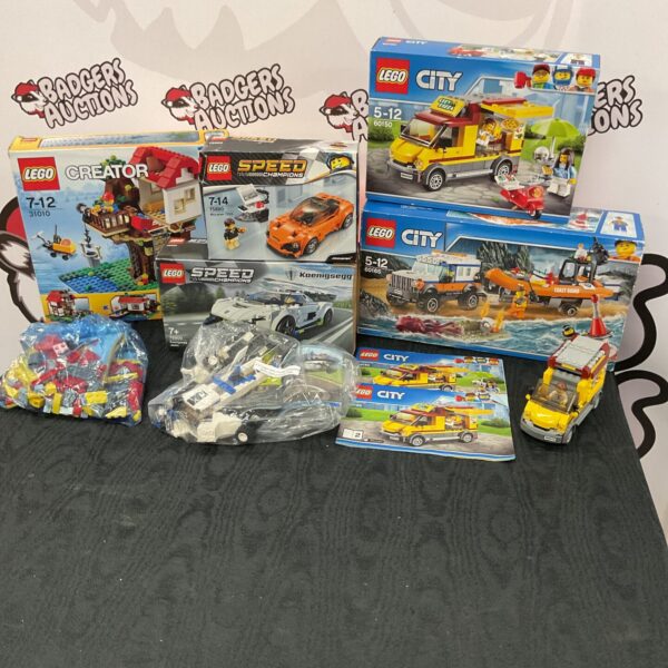 Boxed Lego sets including Lego City and Creator lines.