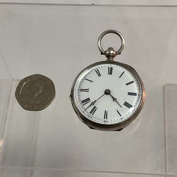 Antique silver Vacheron Constantin pocket watch with Roman numerals.