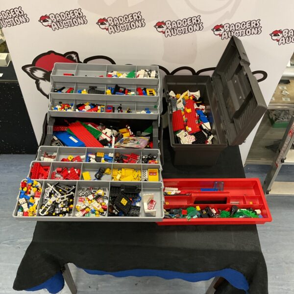 Vintage Lego collection with colourful bricks and minifigures.