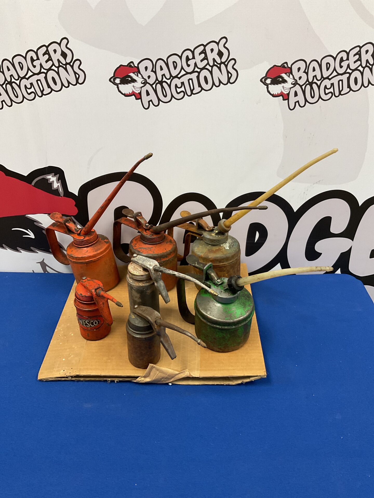 065 Collection of 7 vintage oil cans including wesco