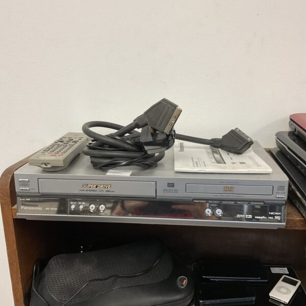 Panasonic NV-VP30 DVD/VHS combo recorder, vintage retro player.