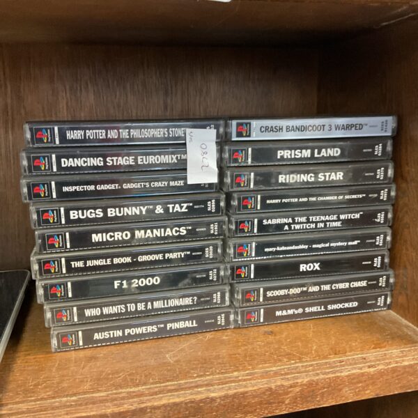 PlayStation games lot featuring Harry Potter and Bugs Bunny titles.