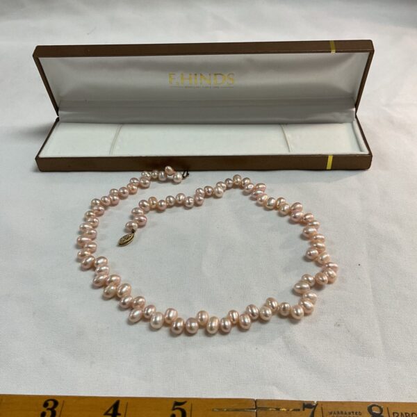 Vintage cultured pearl necklace with 14k gold clasp.