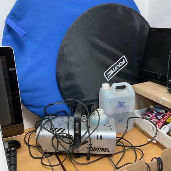 Photography backdrop kit with fog machine and carry bag.