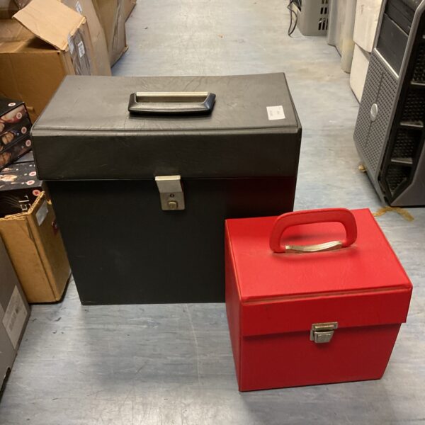 Vintage vinyl record storage box with red exterior.