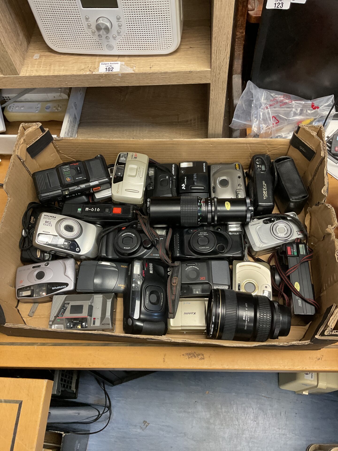 104 Large lot of 35mm cameras & lenses including nikon ed if 077 lens