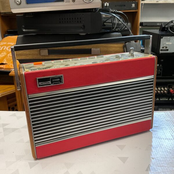 Vintage red Roberts RP26B transistor radio in good condition.