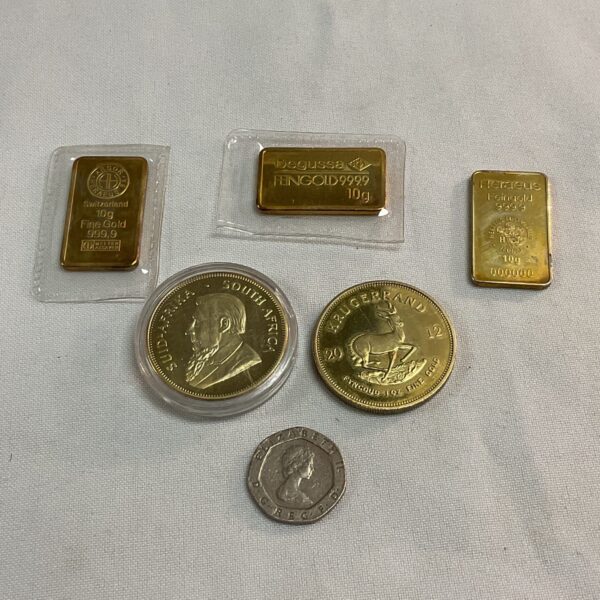Replica Kruger Rand coins and ingots set for collectors.