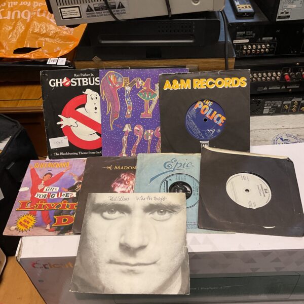 Vintage vinyl records lot including Madonna and Ghostbusters singles.