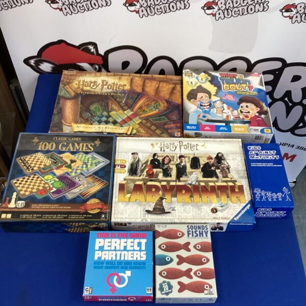 Selection of vintage board games including Harry Potter game.