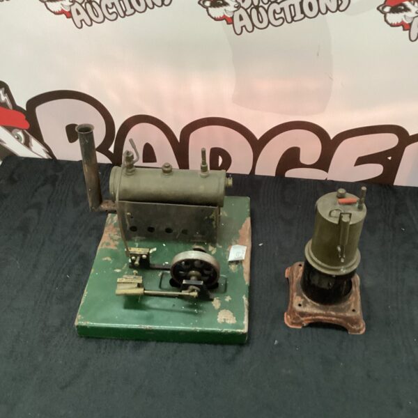 Vintage steam engine side view, antique collectible model.