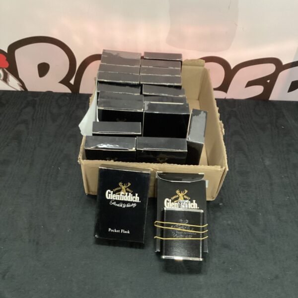 Lot of Glenfiddich hip flasks in a cardboard box.