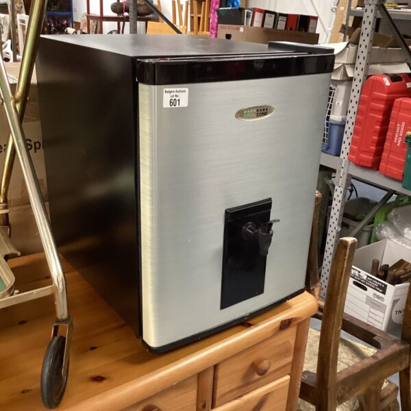 Silver Cool Zone table top fridge on a display shelf.