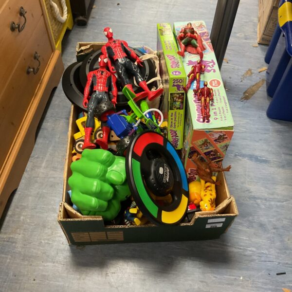 Mixed toy lot featuring Marvel and Hasbro action figures and toys.