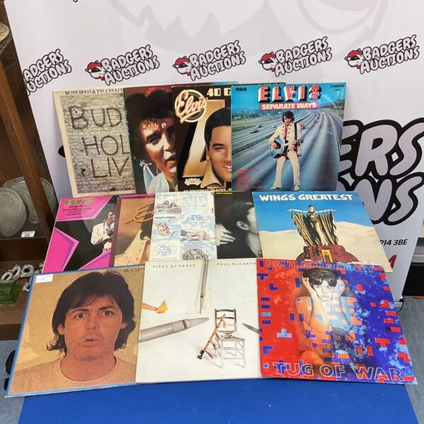 Lot of vintage vinyl records including Elvis and Paul McCartney.
