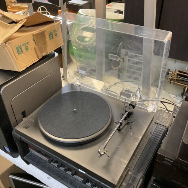 Black Project Debut II turntable with dust cover.