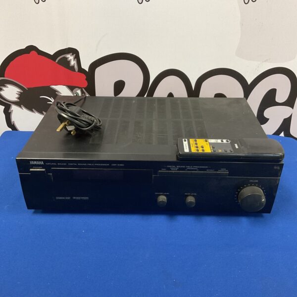 Black Yamaha DSP-E390 natural sound amplifier, vintage audio equipment.