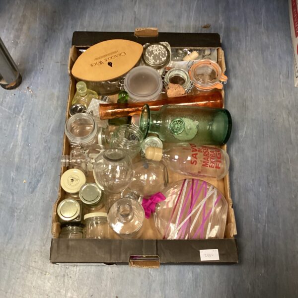 Assorted vintage jars and bottles in a mixed lot collection.